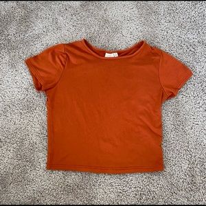 Burnt orange tight slightly cropped